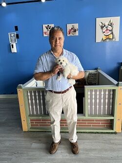 Happy family with their new Pettito puppy
