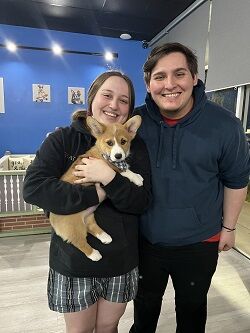 Happy family with their new Pettito puppy