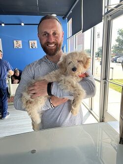 Happy family with their new Pettito puppy
